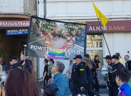 anti-LGBT demonstrators following Gdansk Pride in 2017 with a hate-banner